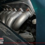 Mit einem Schnitzer Fächerkrümmer...Der Motor wird aber noch durch einen 3,73,8 Liter ersetzt... BMW E30 Cabrio 335i Hartge